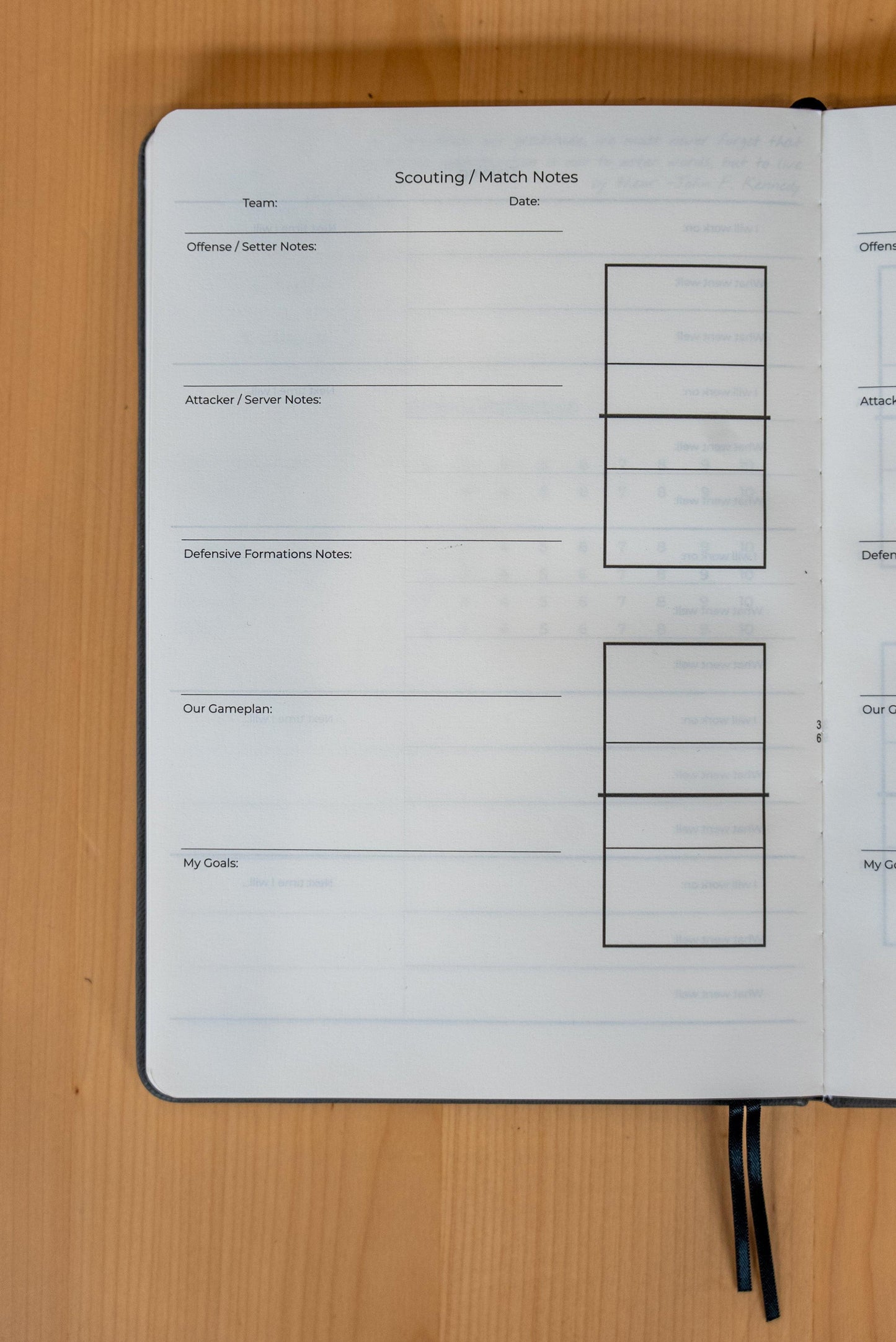 Close-up of The Player's Notebook by balancetms, showing its cover with a sleek design and the product title embossed.