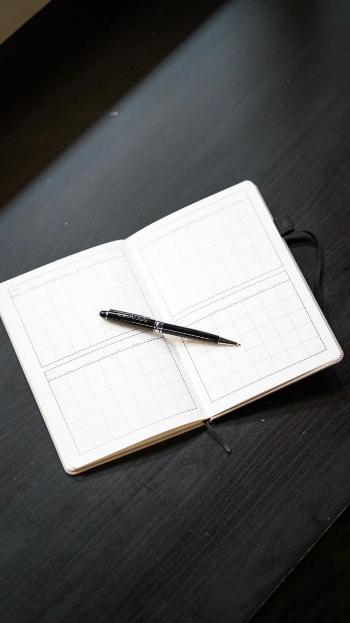 Balance weekly planner by balancetms with daily pages, colorful tabs, and a compact design for organized planning.